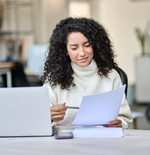Professional reviewing financial reports representing bookkeeping services in Billings, Montana